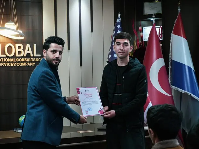 A participant receiving a certificate of participation