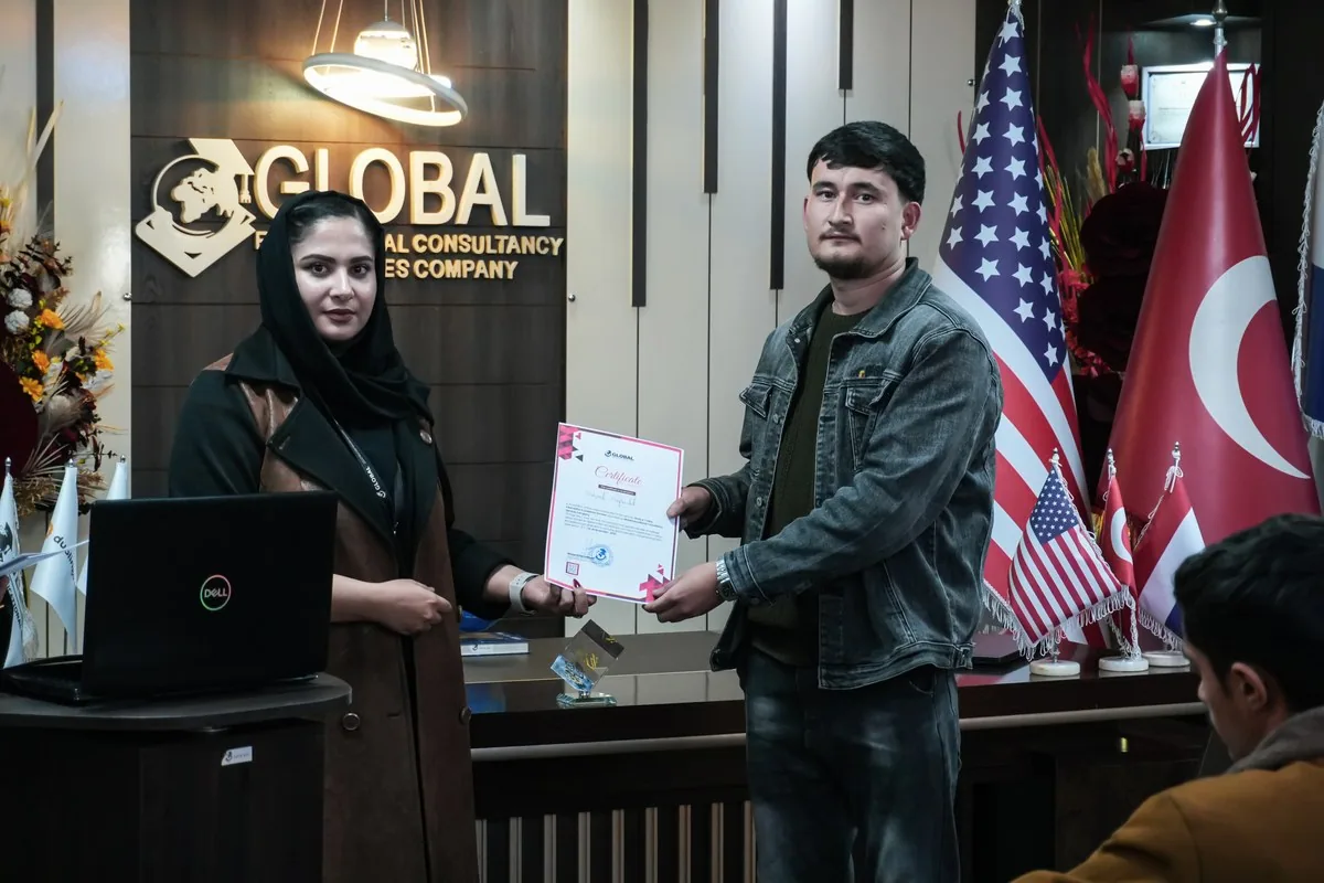 A participant receiving a certificate of participation