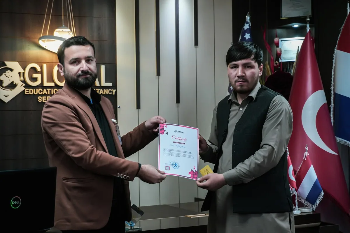 A participant receiving a certificate of participation