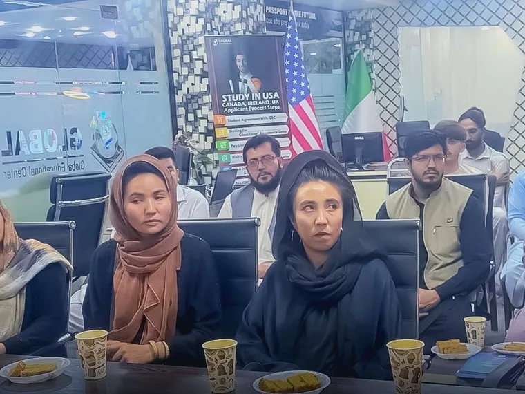 Students listening during the session